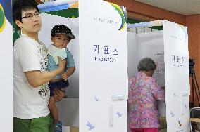 S. Koreans vote in local elections seen as referendum on Park gov't