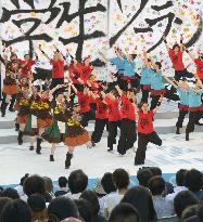 Young people perform 'Yosakoi' dance on stage in Sapporo