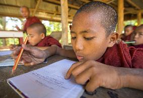 Boy monks study at temple in Myanmar