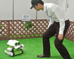 Sharp unveils security robot