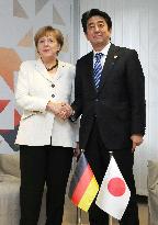Japan, German leaders meet in Brussels