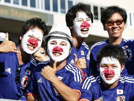 Supporters with nat'l flag face paints