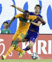 Sakai vies for ball in World Cup warm-up game vs. Zambia