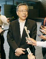 Fukushima Gov. Sato speaks to reporters in Tokyo