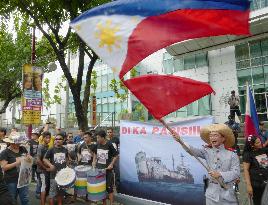Filipinos slam China intrusions on Independence Day