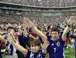 Many fans at Tokyo Dome cheer for World Cup match