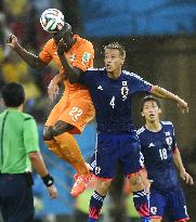 Honda in action against Ivory Coast in World Cup