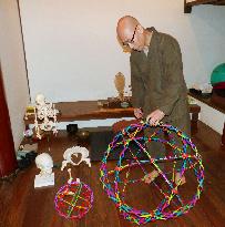 Priest shows items for teaching Zen meditation