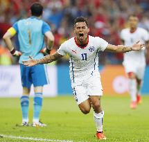 World Cup holders Spain crash out in 2-0 loss to Chile