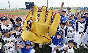 Giant baseball glove unveiled in disaster-hit Ishinomaki