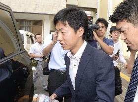 Police investigate Japan's youngest mayor over bribery