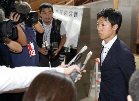 Police investigate Japan's youngest mayor over bribery