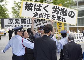 Protesters around TEPCO shareholders' meeting site