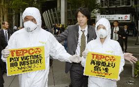 Anti-reactor activists at TEPCO shareholders' meeting