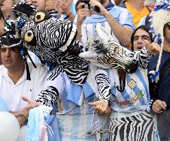 Argentine supporters cheer at World Cup in Brazil