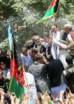Abdullah supporters stage protest in Kabul