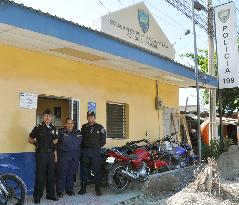 Police officers at "koban" box in Honduras