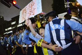 10,000 protest in Tokyo over security policy change