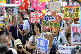2,000 protest in Tokyo over security policy change