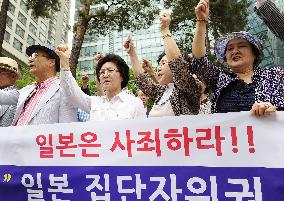 Protests in Seoul over Japan's security policy change