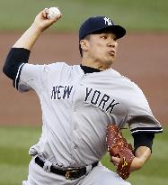 Tanaka, Yankees snap losing streaks in win over Twins