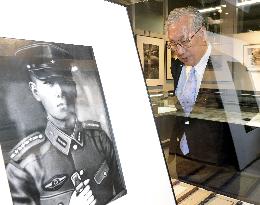 WWII suicide pilot's brother looks at mementos