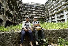 Ex-residents visit "Gunkanjima"