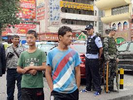 Police on alert near Urumqi bazaar