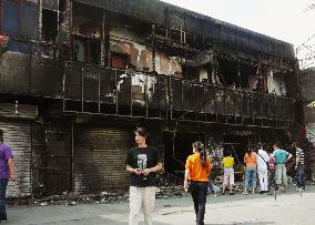 Burnt shops in Urumqi