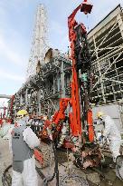 TEPCO shows installation work for underground ice wall