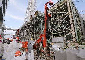 TEPCO shows installation work for underground ice wall