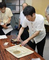 Workshop to restore damaged documents