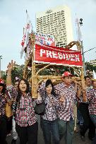 Rival camps declare victory in Indonesia presidential election