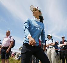 Japan's A. Miyazato walks to new hole at British Open