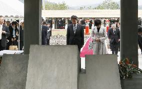 Japan PM Abe visits war memorial in Papua New Guinea