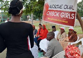 Woman demands rescue of abducted schoolgirls in Nigeria
