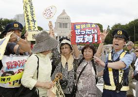 People stage rally against security policy change