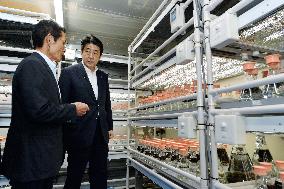 PM Abe visits fisheries promotion center in Miyagi