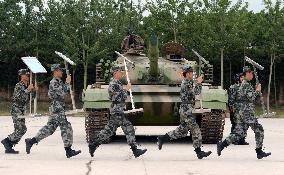 Chinese military shows tank before 87th anniv.