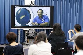 Japanese astronaut Hoshide talks on TV from U.S. seabed