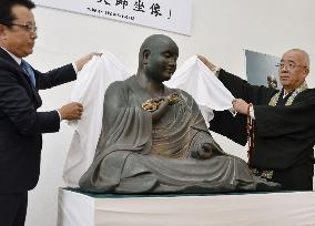 Ceramic replica of Buddhist saint Kukai's wooden statue