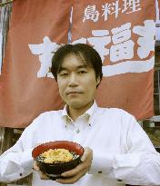 Rice bowl topped with sea urchin popular in Ishinomaki
