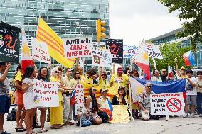 People rally against China in front of U.N. building