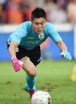 Standard's Kawashima in action in Champions League game