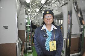 Attendant for women-only train cars ready to work
