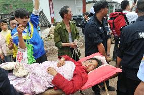 Woman rescued after quake