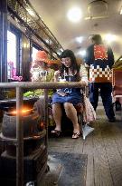 Passengers eat ice cream on 'stove train'