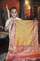 Thai designer shows traditional silken fabrics