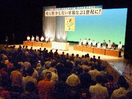 Participants in anti-A-bomb confab pray for victims