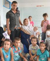 Homeless Palestinians live in school building in Gaza